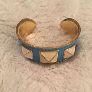 Turquoise and cream colored cuff bracelet